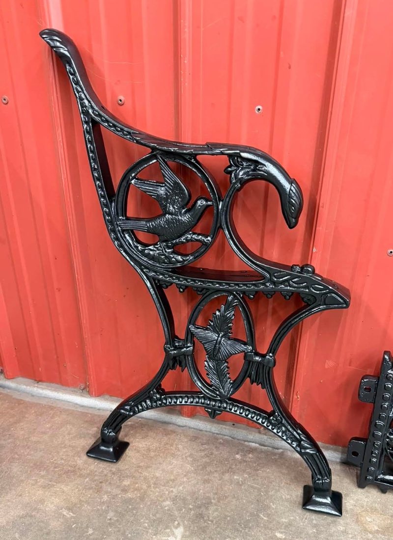 Cast iron bench end after sandblasting and black powder coat