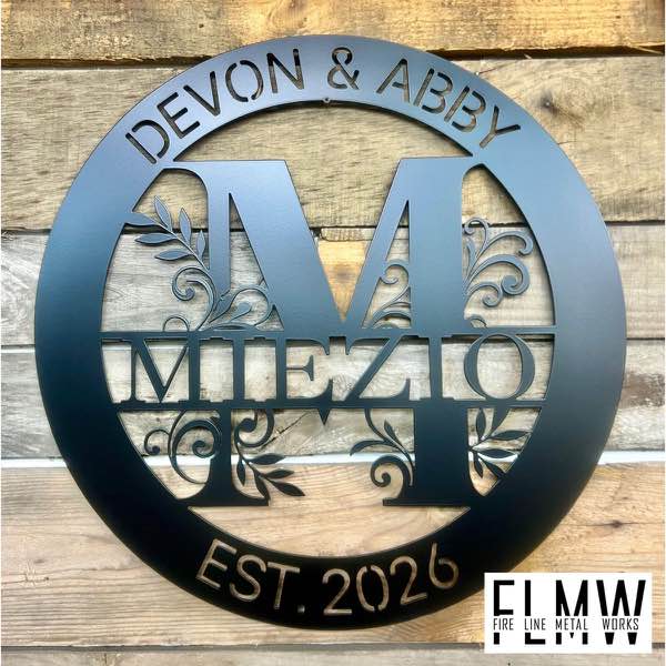 Round plasma cut family name monogram sign in black