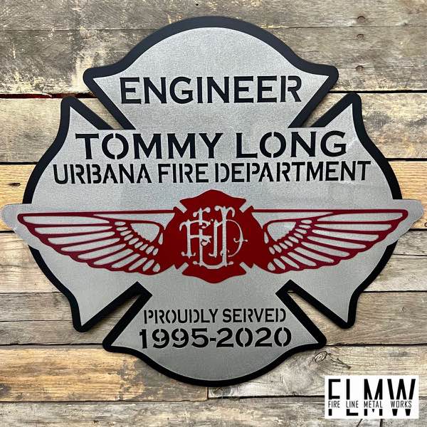 Layered plasma cut Urbana Fire Department retirement sign in silver, black, and red