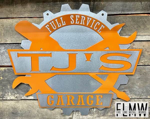 Orange and silver 2 layer plasma cut garage sign with wrenches and a gear