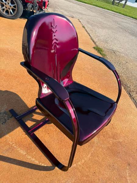 Old metal chair restored and powder coated in a burgundy finish