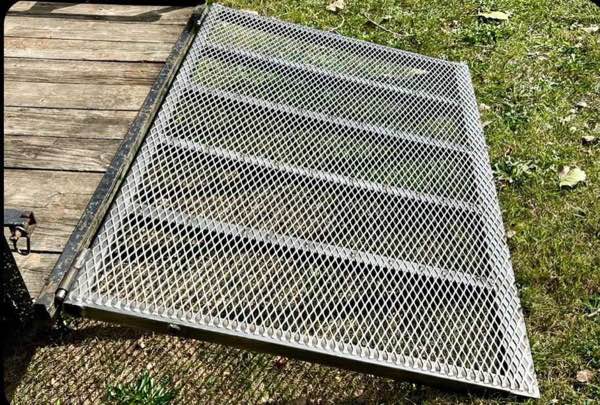 New heavy duty expanded metal ramp gate on a utility trailer