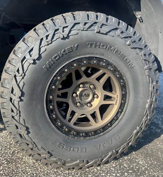 2 tone bronze and black powder coated wheel mounted on a truck