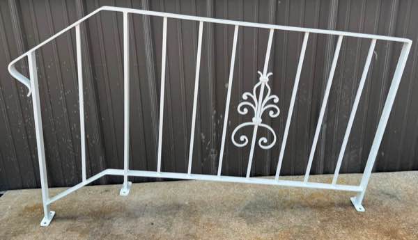 Old metal railing restored and powder coated white